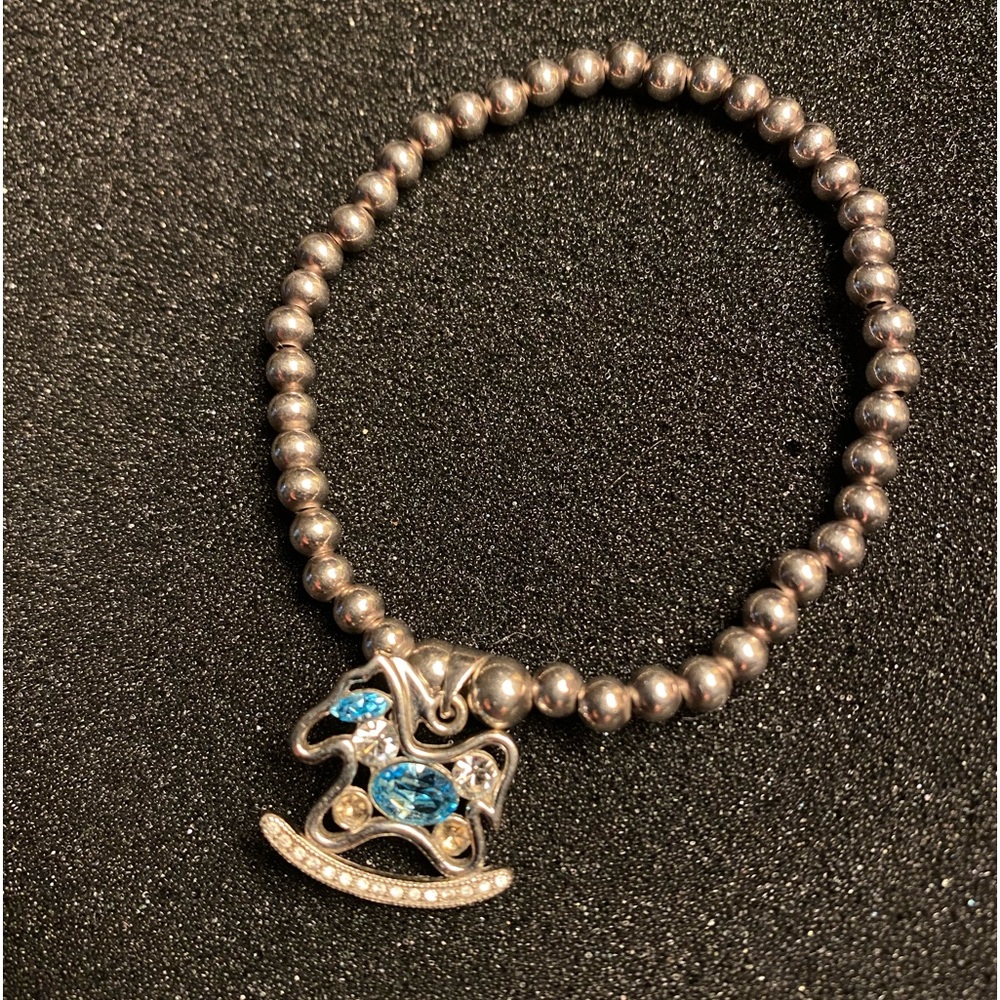 Sterling Silver stretch cord Bracelet with rhinestones Aqua Pony Toy charm Beads